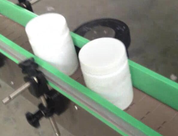 د ګرد سوګر جار لپاره د بوتل لیبل کولو ماشین ، د بوتل کولو او لیبل کولو ماشین