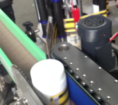 د ګرد سوګر جار لپاره د بوتل لیبل کولو ماشین ، د بوتل کولو او لیبل کولو ماشین