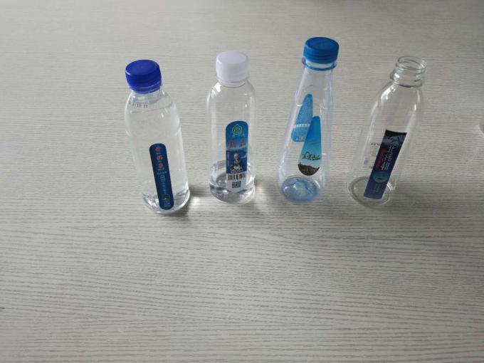 د پلاستيکي بوتل لیبل کولو ماشین ، د معدني اوبو بوتل لیبل کولو ماشین څښل